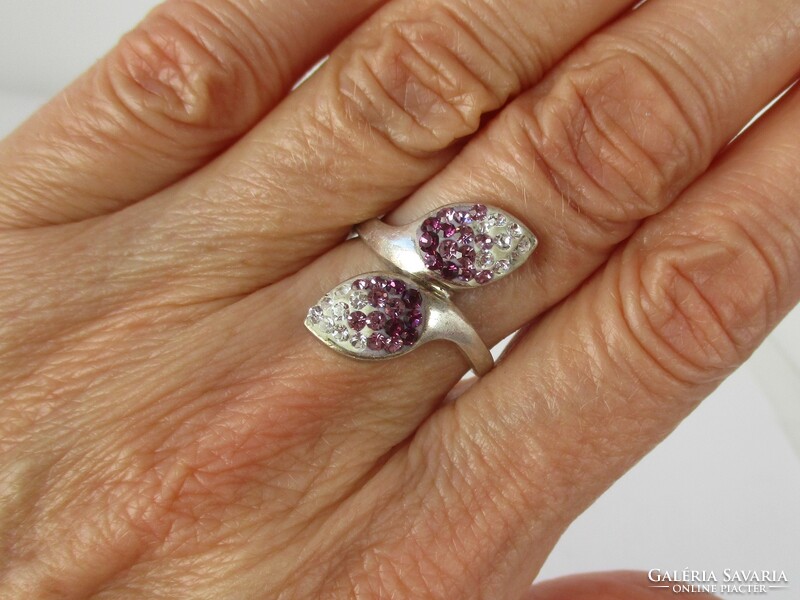 A very nice large silver ring with purple stones