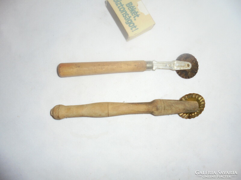 Two pieces of old corn cutter, pasta slicer, shearer - together