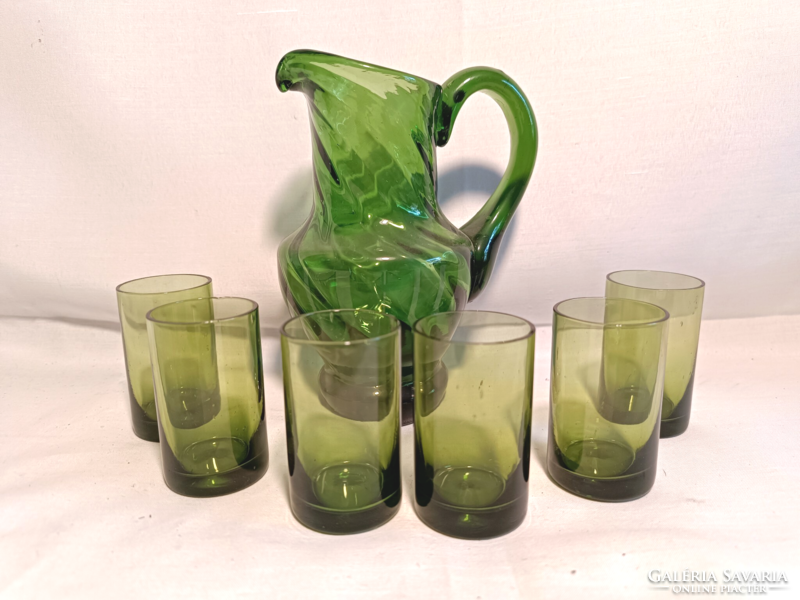 Green glass jug with glasses