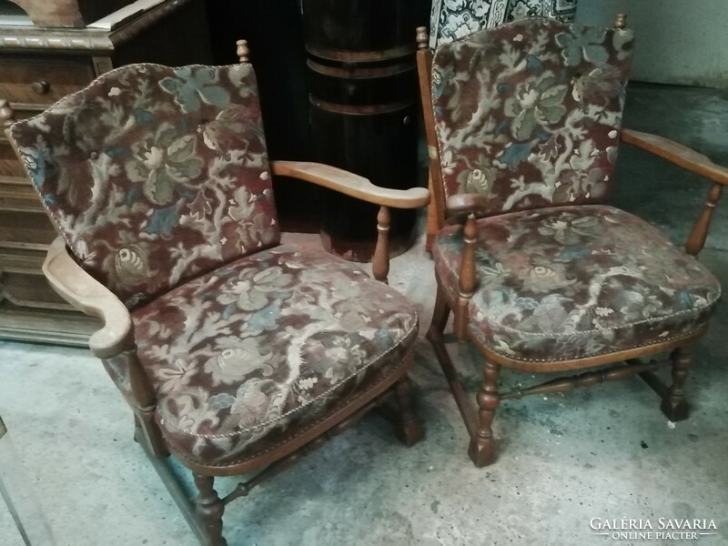 A pair of retro large armchairs