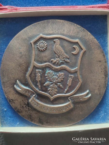 Bronze coat of arms of Tiszakerecseny