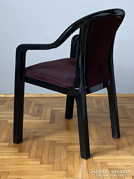 Grosfillex boutique marked black plastic design armchair with burgundy cover