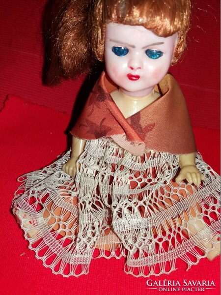Antique celluloid hair glass eyes sleeper-blinking hair plantable doll in the condition shown in the pictures