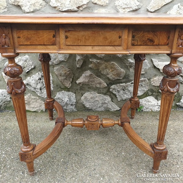 Decorative table with carved legs
