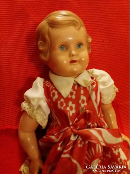Antique minerva celluloid toy doll in original dress according to the pictures