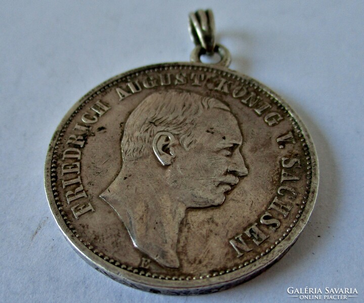 Old silver brand pendant from 1912