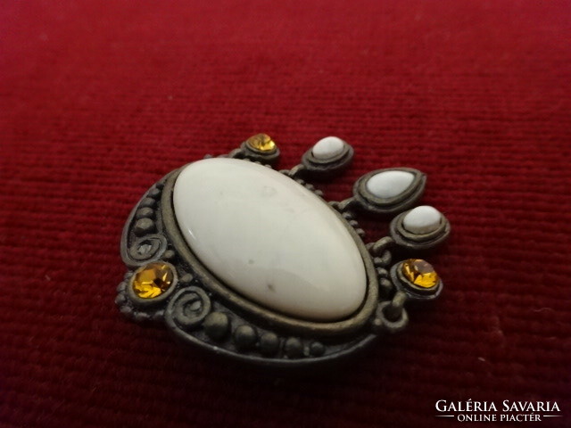 Brooch from the 60s, the center is cream-colored, the edges are decorated with yellow stones. Jokai.