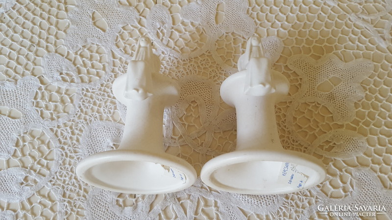 A pair of angelic ceramic candle holders from an old picture gallery