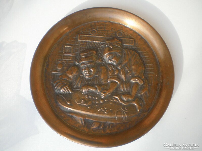Large brass wall-mounted remote, classic, 35 cm diameter.