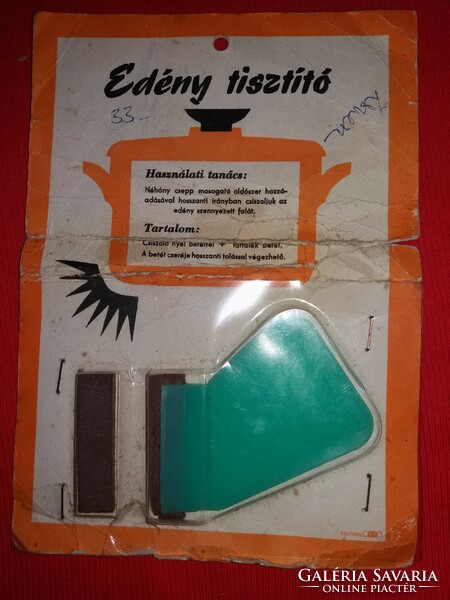 Retro plastic mass-produced pot cleaner in its original packaging as shown in the pictures