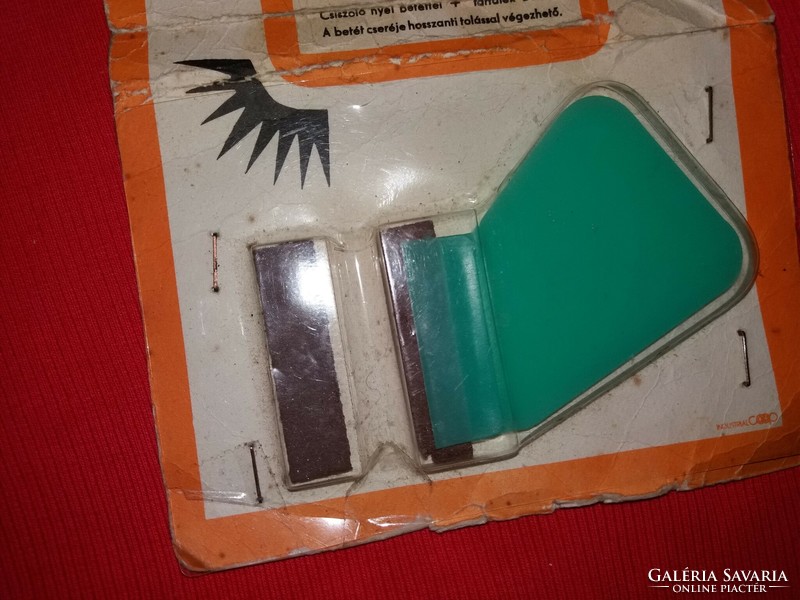 Retro plastic mass-produced pot cleaner in its original packaging as shown in the pictures