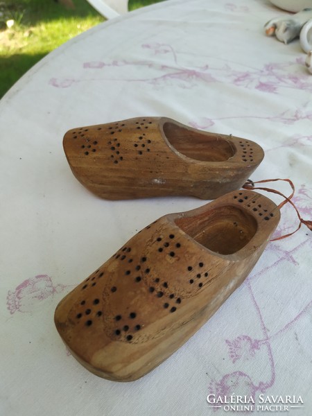 A pair of retro, ornately carved wooden clogs for sale! Wall decoration for sale!