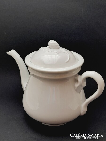 Antique white porcelain teapot