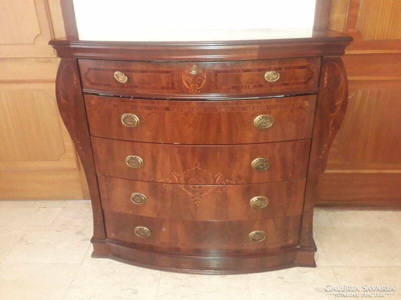 Inlaid chest of drawers.