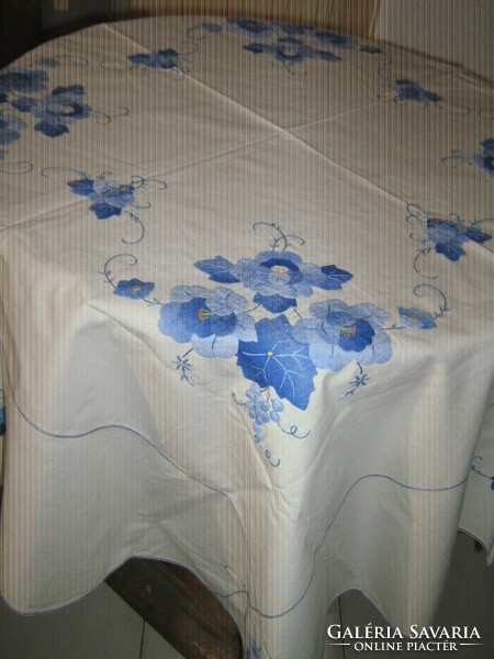 Beautiful vintage sewn-on floral embroidered tablecloth