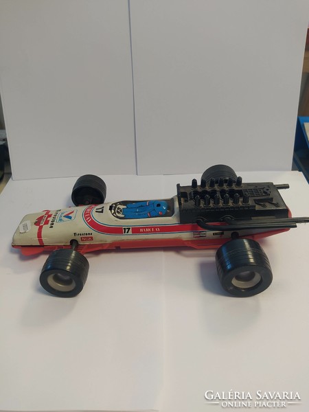 Old toy disk racing car