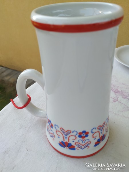 Hollóházi porcelain jug with a folk design is for sale for 