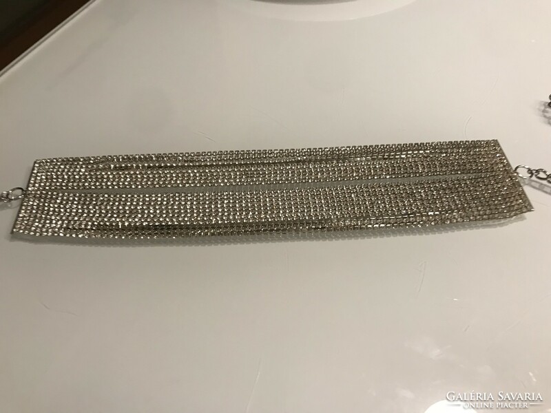 Wide rhinestone bracelet made of twenty small, shiny chains, 24 cm long