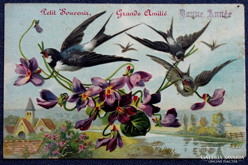 Antique embossed greeting card with swallows and violets