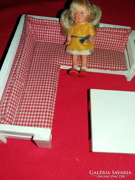 Old Ari hairy rubber doll in clothes and the accompanying wooden kitchen corner settee toy as shown in the pictures