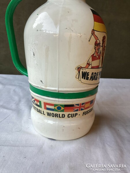 2 Liter beer bottle with buckle 1990 soccer world championship.