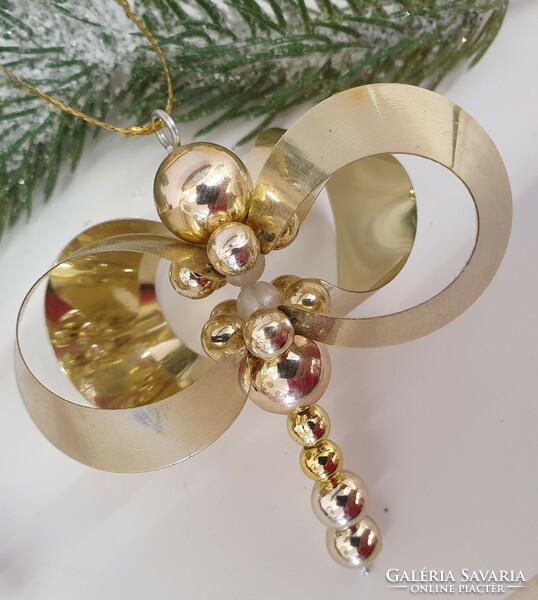 Christmas tree decoration with foil and pearls
