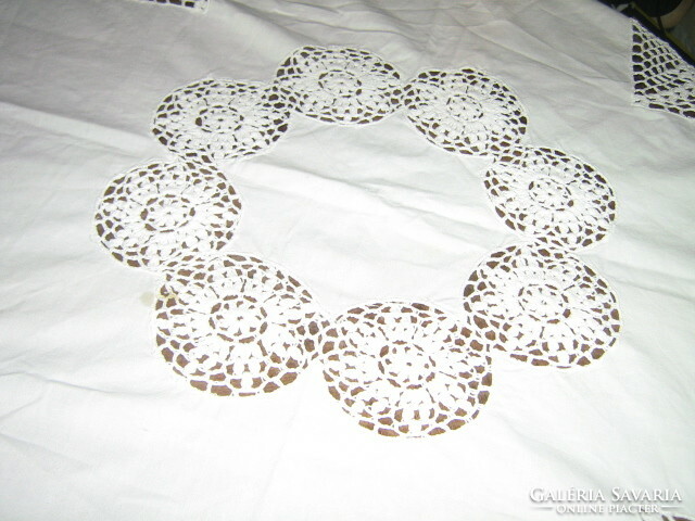 Fabulous white handmade white tablecloth with crochet edges and floral inserts