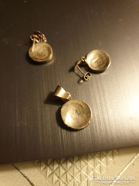Silver earrings and pendant set