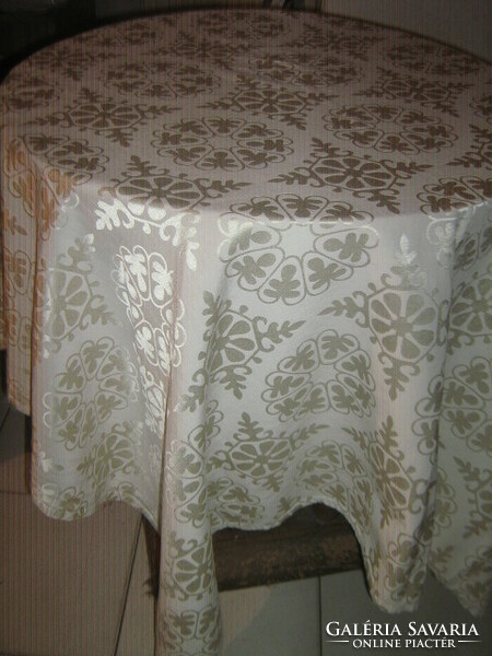 Beautiful cream colored elegant bright golden yellow patterned silk tablecloth