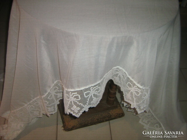 Beautiful vintage white lacy panoramic curtain