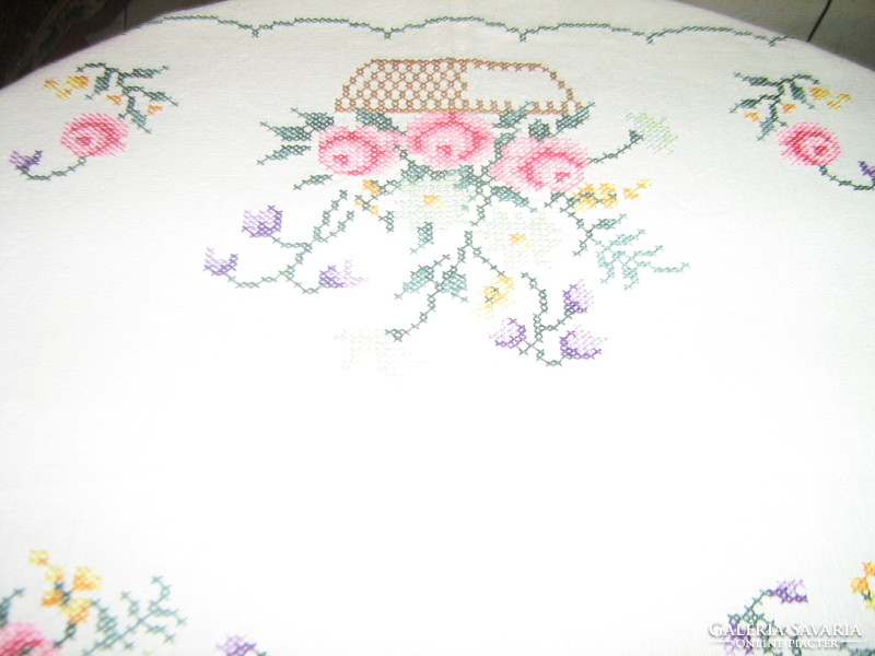 Beautiful antique tablecloth with flower basket embroidered with small cross stitch