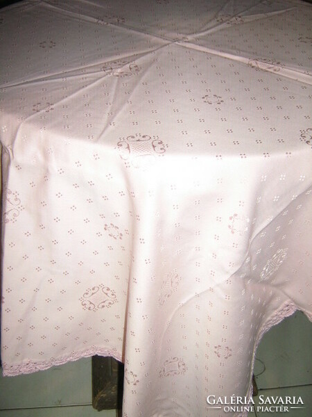 Beautiful elegant pink crochet silk tablecloth with lacy edges