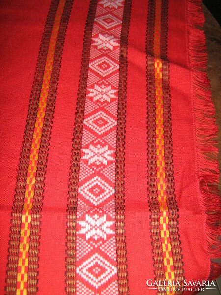 Beautiful red fringed elegant woven tablecloth