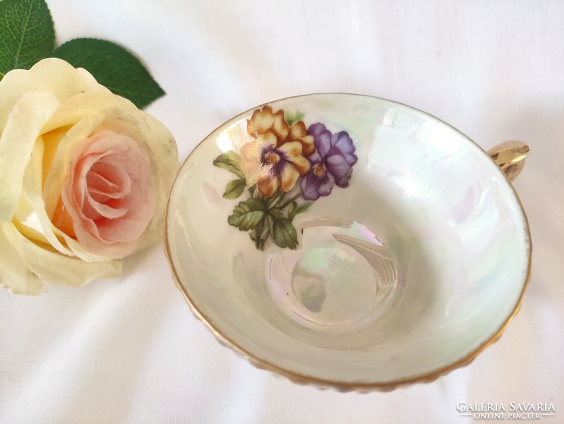 Tea cup with pansy pattern