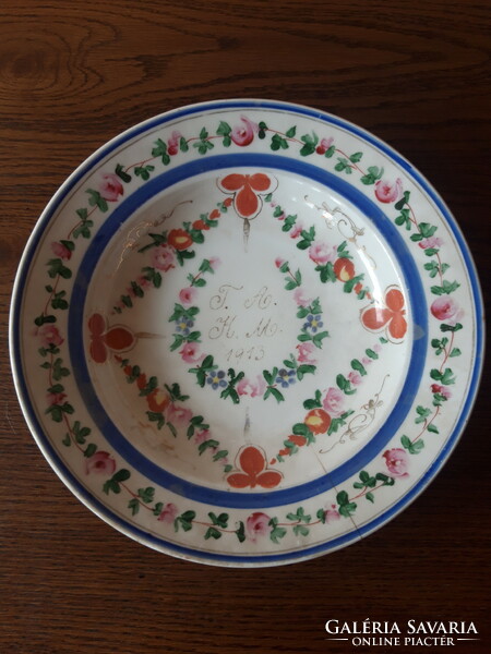 Old, pink, monogrammed, porcelain wall plate - 1913