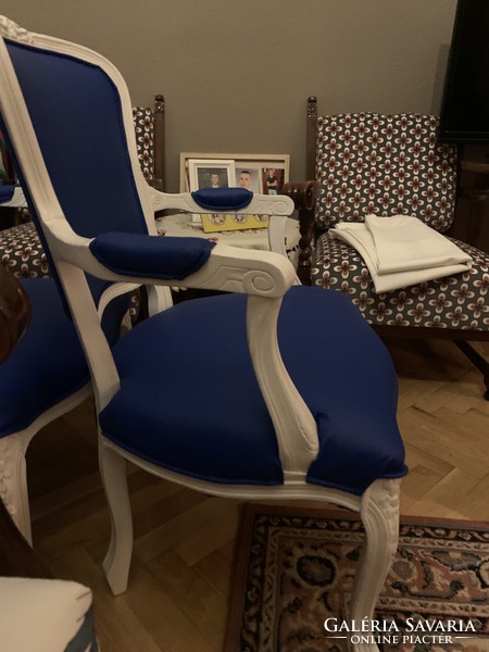 Pair of royal blue chairs with white arms