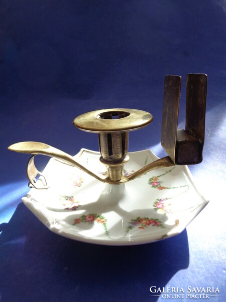 Antique walking candle holder with match holder