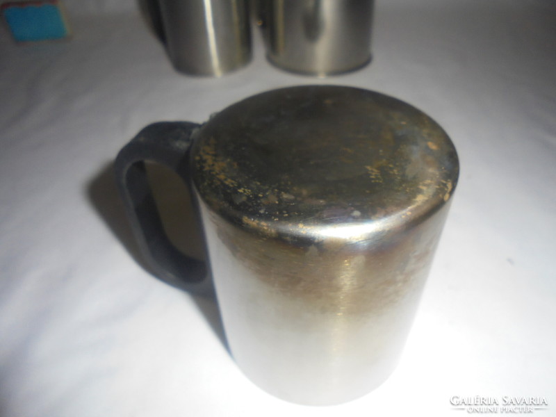 Three pieces of metal, stainless steel tea mug, cup - together