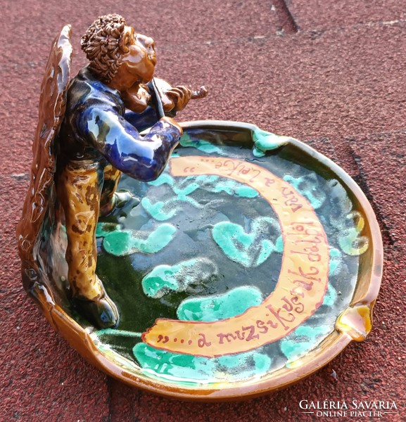 A rarity, an old edited ceramic from the gallery, the musician's soul is made of song...