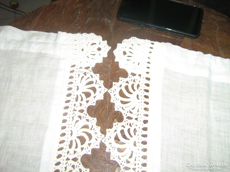 A pair of beautiful vintage-style hand-crocheted lace-edged stained-glass curtains
