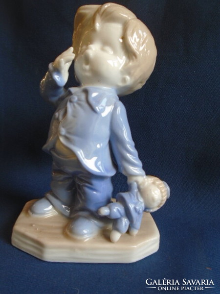 A yawning little boy, in a very fine German porcelain display case, a true collector's rarity