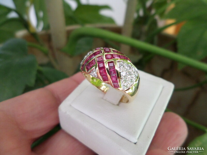 Wide gold ring with rubies and brilliants 18k