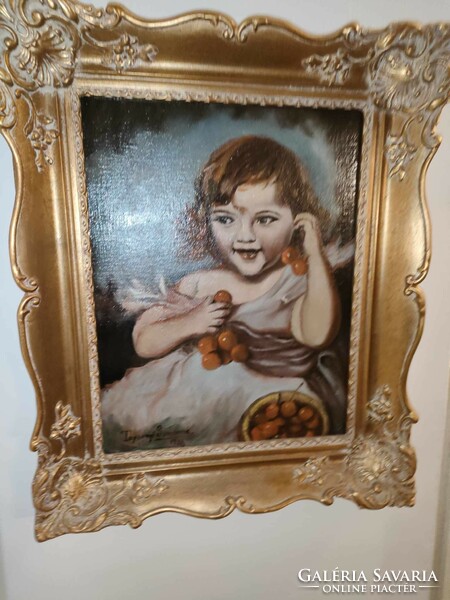 Little girl picking cherries oil wood in a beautiful blonde frame