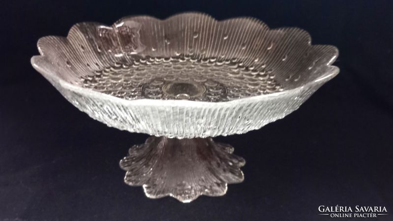Glass serving bowl with base, table in the middle