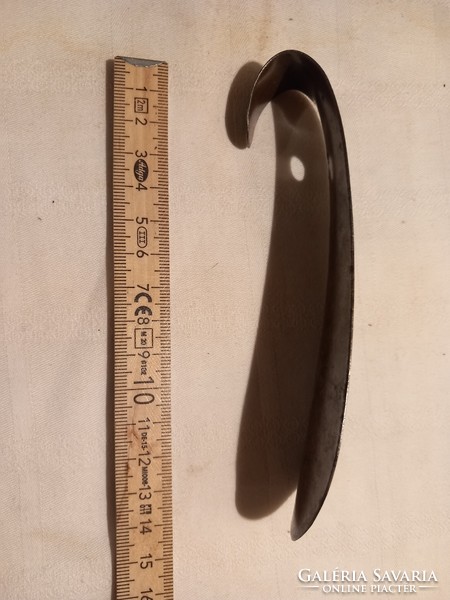 Old marked iron shoehorn