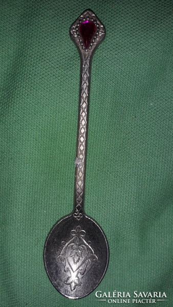 Antique silver-plated alpaca with red stone chiseled engraved pattern, like a decorative spoon according to the pictures