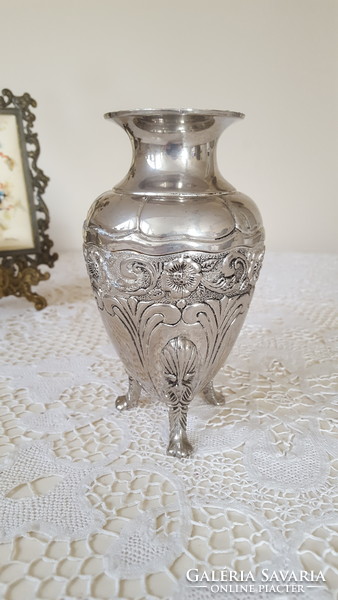 Silver-plated, embossed vase with lion's feet