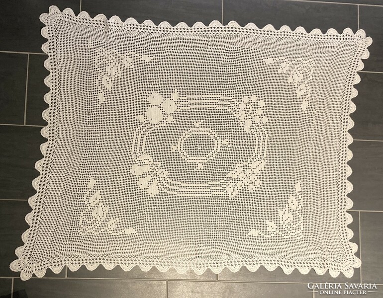 Large hand-crocheted antique tablecloth