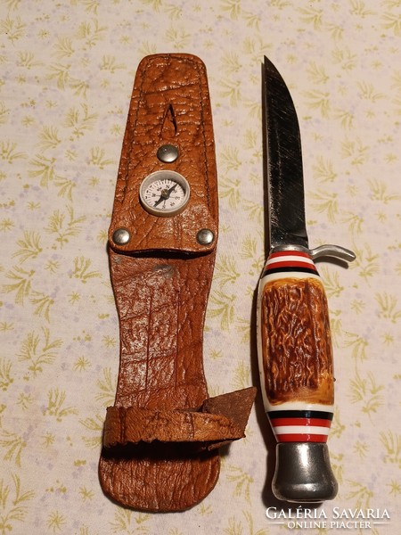Retro dagger in leather sheath with compass