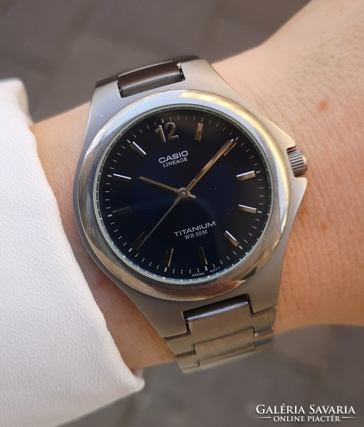 Casio lineage titanium quartz watch! Serviced, with warranty, tiktakwatch service card!